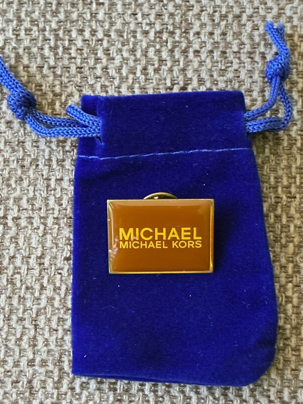 MICHAEL Michael Kors Brown Enamel Logo with Gold Tone